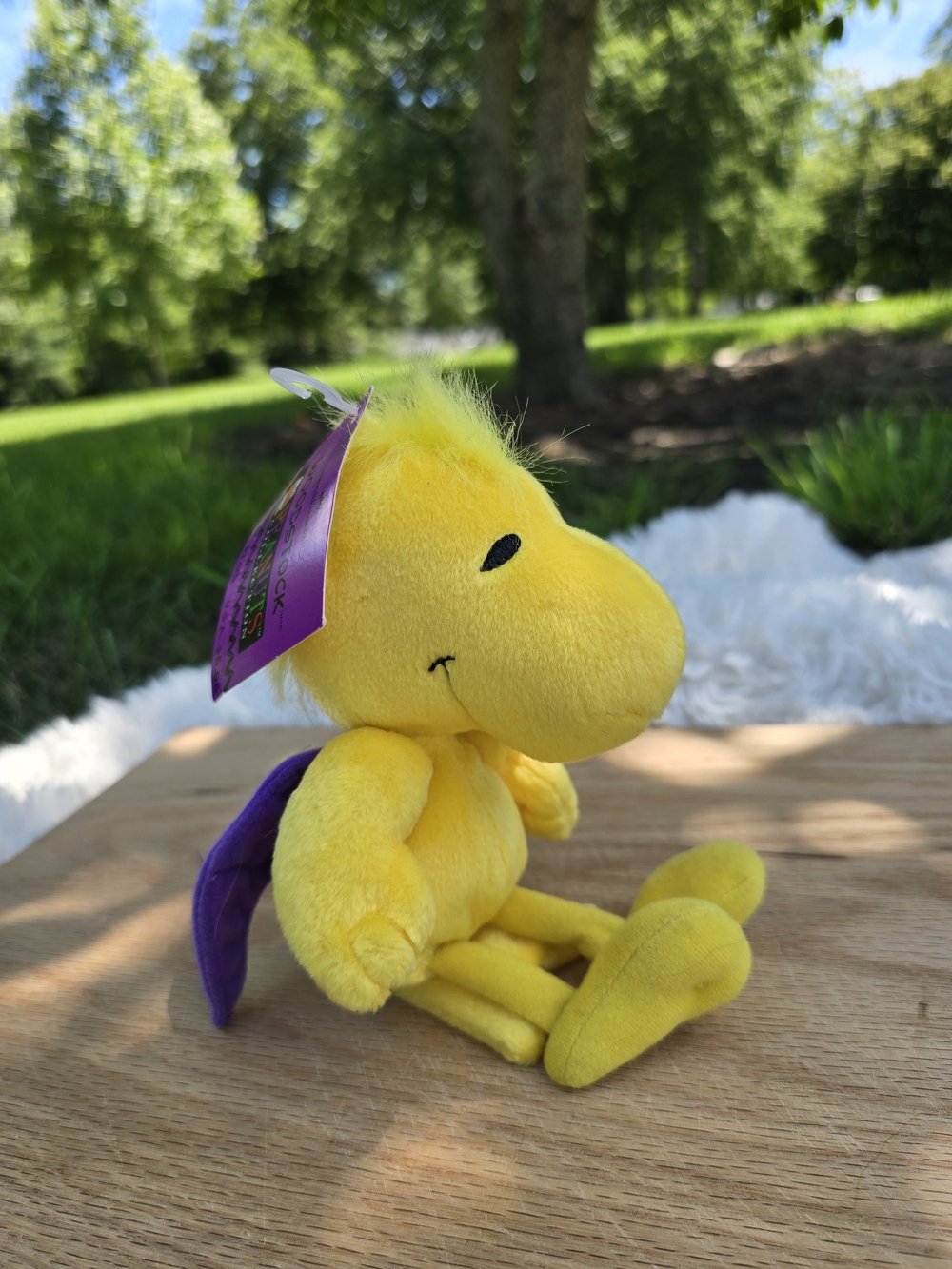 Hallmark Peanuts Woodstock plush features purple felt bat wings